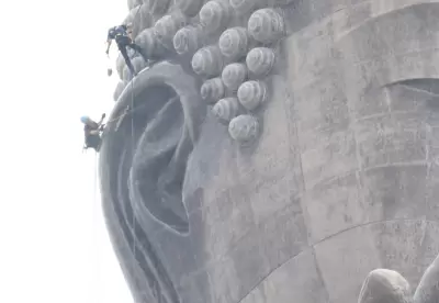 two men and a pressure washer